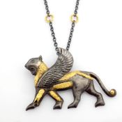 Wear The Essence of Mythology! Mythological Object Intricately Engraved In Silver, With Gold Acce...