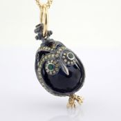 An Exquisite Owl Necklace Detailed With Brilliant Diamonds and Gold On Silver.