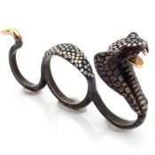 An Exquisite Snake Ring Detailed With Brilliant Diamonds and Gold On Silver.
