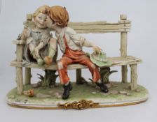 Capodimonte Figurine Girl & Boy on Bench
