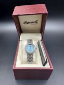 An Ingersol Diamond ladies wristwatch, boxed and with accompanying paperwork