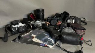 A selection of cameras and camera equipment various makers to include Pentax Miranda and Zenit
