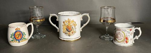 A small selection of Royal Commemorative ware mugs to include King Edward, Queen Victoria and the