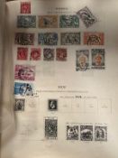 A Stanley Gibbons album containing a selection of UK and world stamps and some loose sheets