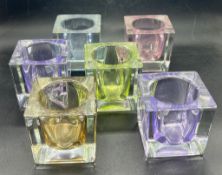 Six glass candle holders
