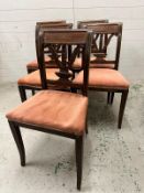 Five Victorian dining chairs with top rail with brass inlaid roundels decorated palm and urn