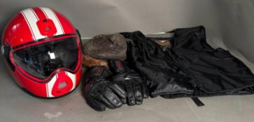 A selection of motorcycle clothing to include a Harley Davidson zip vest, Dynamic gloves and a