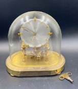 Kundo German clock, glass dome