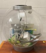 A large cylindrical Fish Tank