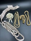 A collection of costume jewellery, pearl necklaces