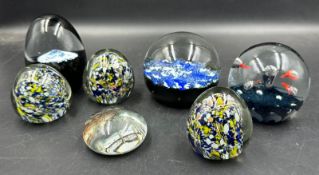 A selection of paper weights various styles