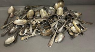 A quantity of silver plate and white metal flatware to include spoons, forks and a ladel