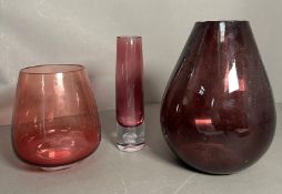 Three glass vases in salmon pink and purple amethyst