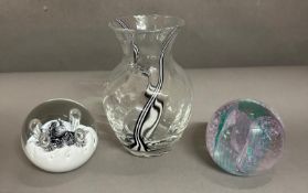 A selection of Caithness glass, two paperweights and a vase
