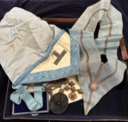 A cased selection of Masonic ephemera to include sash, buttons and badges
