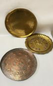 Three Indian copper and brass trays