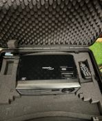 A cased Optoma projector