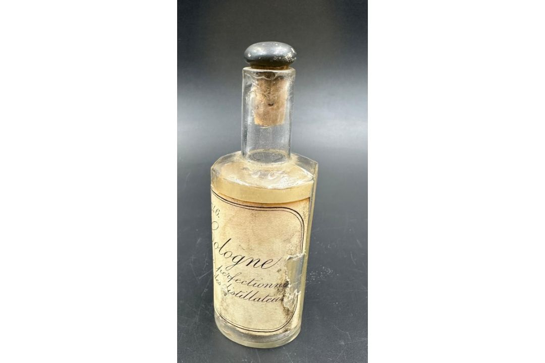 A vintage eau de cologne bottle with a cork stopper - Image 2 of 3