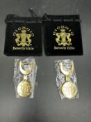 Two Giorgio Beverley Hills keyrings