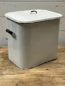 An enamel bread tin