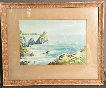 A watercolour of a coastal scene, signed bottom right
