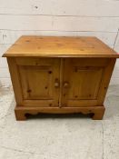 A side cabinet opening to shelves (H57cm W70cm D50cm) AF