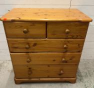 A pine chest of drawers (H82cm W80cm D47cm)
