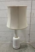 A vintage Danish Heidbig table lamp in white with brass banding