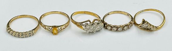 A selection of five various 9ct gold rings in a variety of styles and finishes, combined approximate