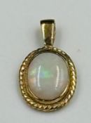 A 9ct gold opal pendant