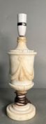 A white marble table lamp with a central sash relief