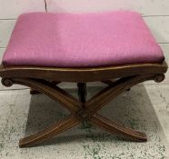 A Regency style upholstered stool with X-frame base (H36cm W50cm D40cm)