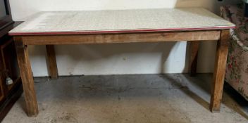 An oak larder table with Formica top (H82cm W184cm D93cm)