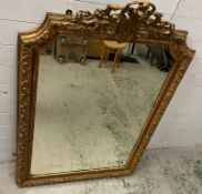 A French giltwood mirror with scrolling crest, floral swags shaped mirror plate (150cm x 96cm)