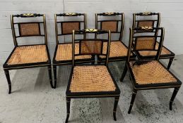 Six Regency style ebonised and parcel gilt chairs with cane seats AF