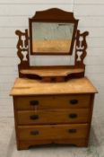 A pine dressing table, three long drawers with a hinged mirror over (H157cm W92CM d44CM)