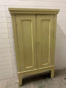 A rustic farmhouse hall cupboard opening to shelves (H186cm W110cm D30cm)