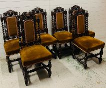 A carved solid oak dining chairs