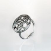 A De Beers Cluster ring, swirl desin set with ninety five round brilliant cut diamonds, weighing