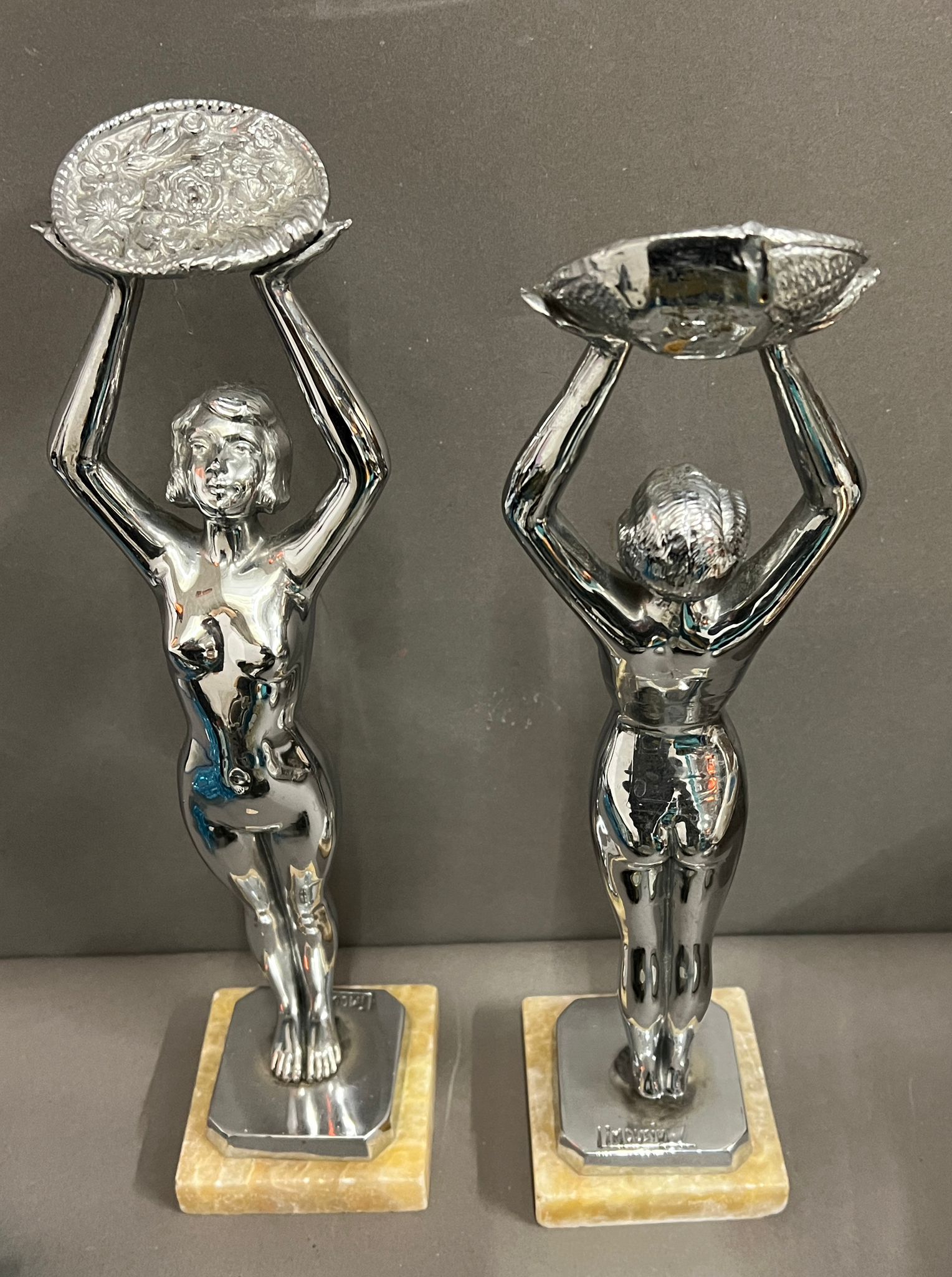 A pair of Art Deco sculptures signed Limousin on a square onyx base (H36cm)