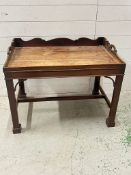 A Georgian mahogany butlers tray on stand, gallery tray sits on square legs (H61cm W80cm D50cm)