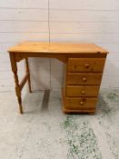 A pine dressing table with four drawers to side (H75cm W92cm D52cm)