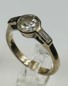 An diamond ring on 18ct white gold, approximate size M and weight 3.9g, approximate 1.1ct with