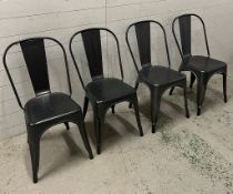 Four Industrial style stackable metal chairs