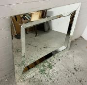 A frame free facet mirror