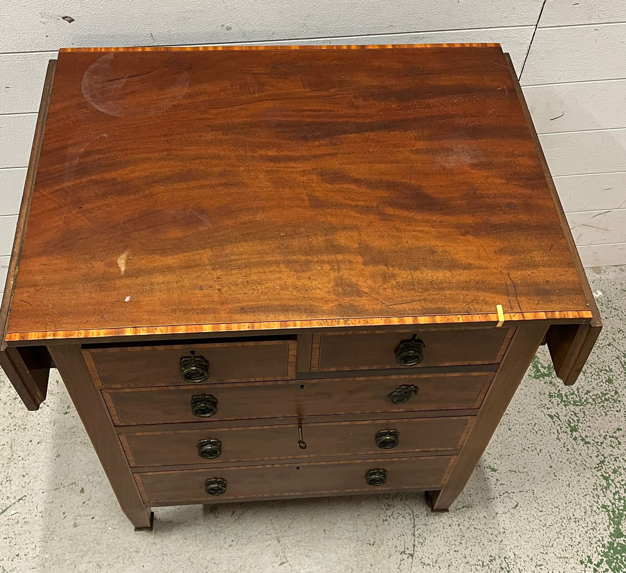 An Edwardian mahogany chest of drawers with drop sides (Open H78cm W100cm D51cm) - Image 4 of 4