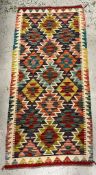 Kilim rug with vibrant colour 150cm x 69cm
