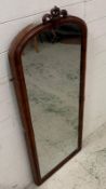 A mahogany full length dressing mirror with scrolling top (H128cm W53cm)