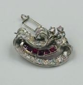 A vintage diamond and ruby brooch, approximate weight 6.6g