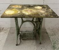 A converted cast iron sewing machine table with marble top (H74cm W89cm D60cm)